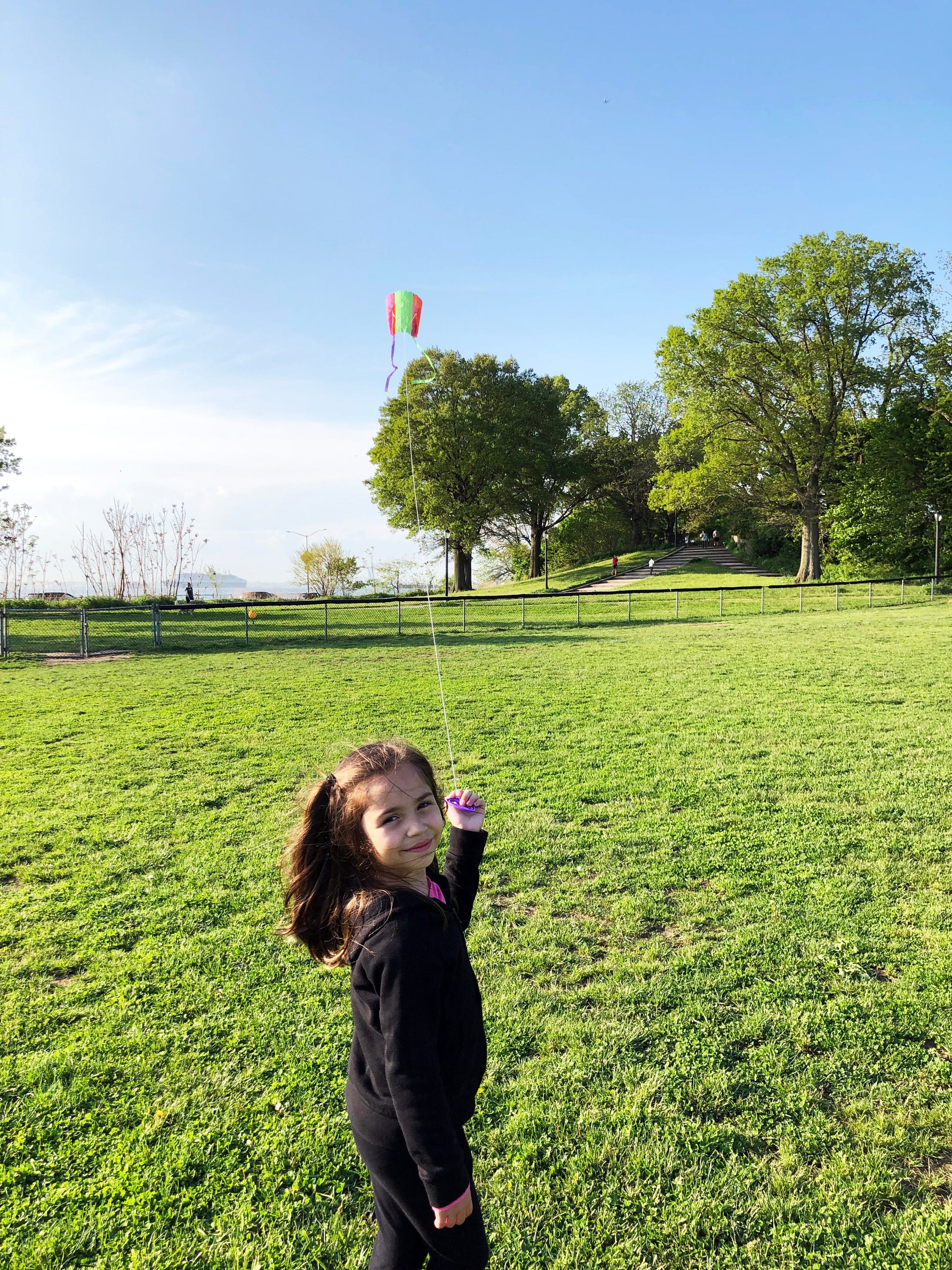 child flying kite