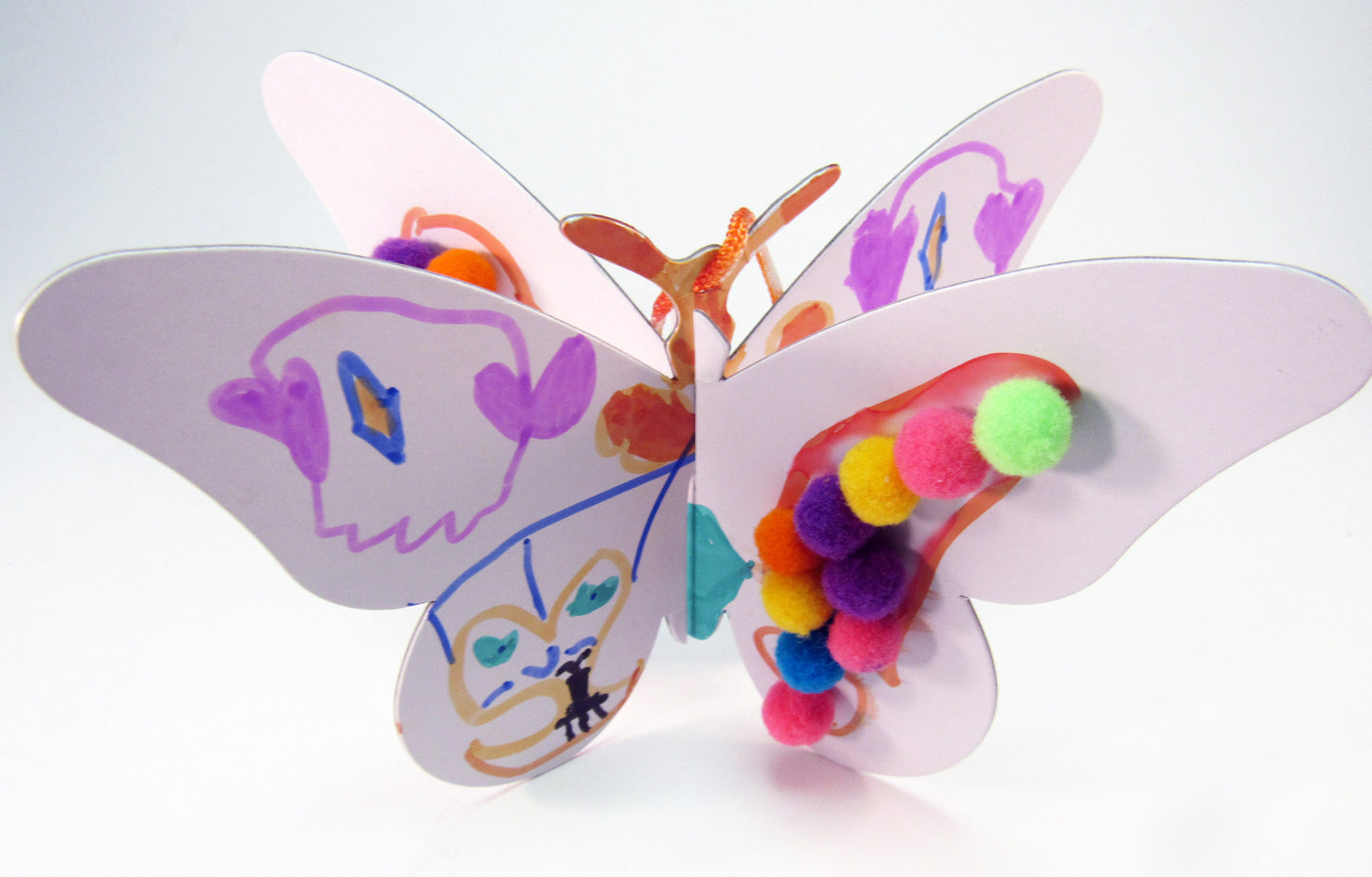 3-dimensional butterfly art project - Ivy Kids Educational Activity Kit featuring the book Gotta Go! Gotta Go! by Sam Swope and over 10 art, literacy, math, and science activities inspired by the story. Learn about monarch butterflies. Perfect kit for spring.