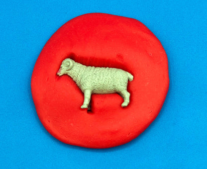 animal stamp in playdough