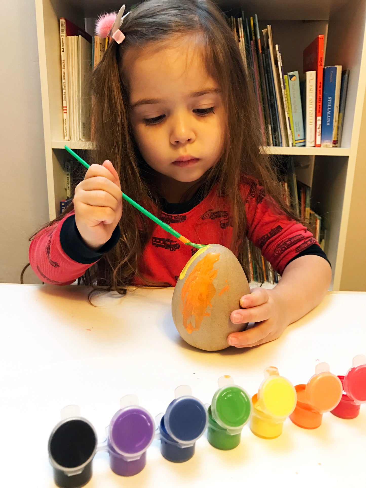 Painting a large paper mache egg