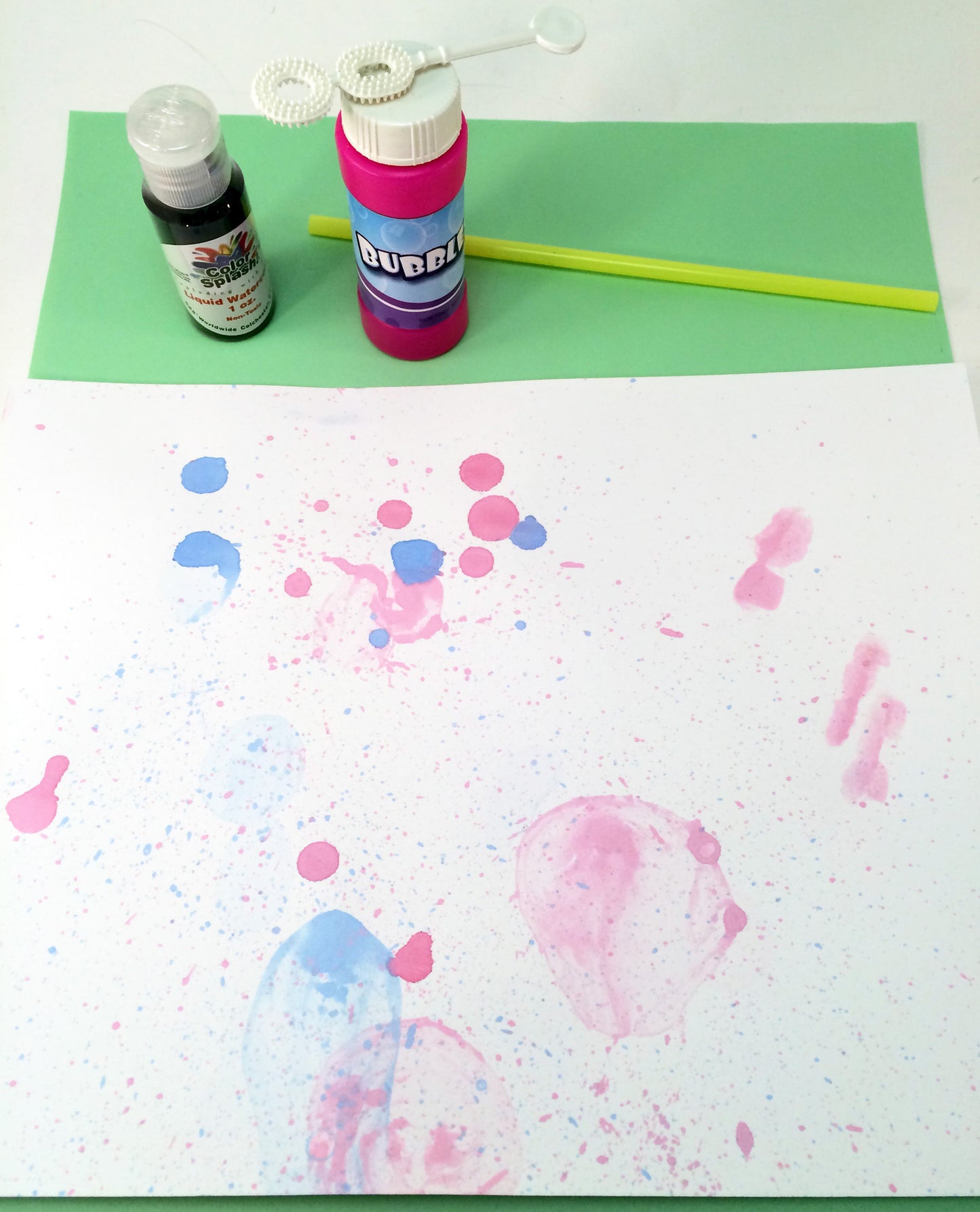 Bubble Painting, creative art activity using wind energy, to go along with May's Ivy Kids kit featuring the book The Wind Blew by Pat Hutchins. 
