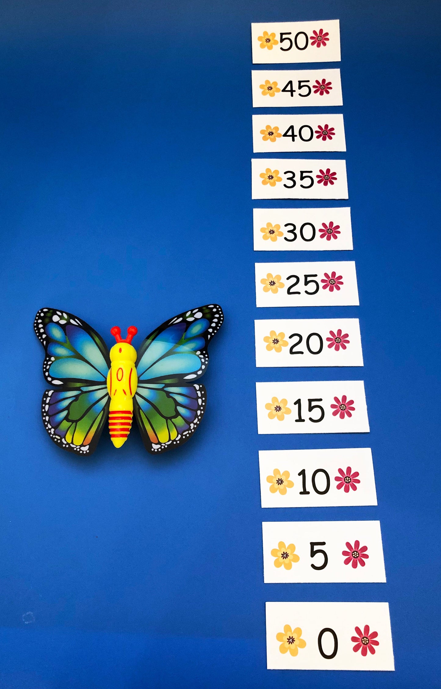 Math game with butterfly toy